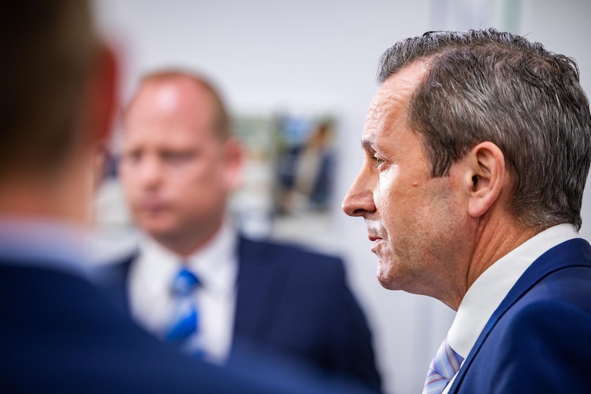 Mark McGowan looks straight ahead at a press conference.