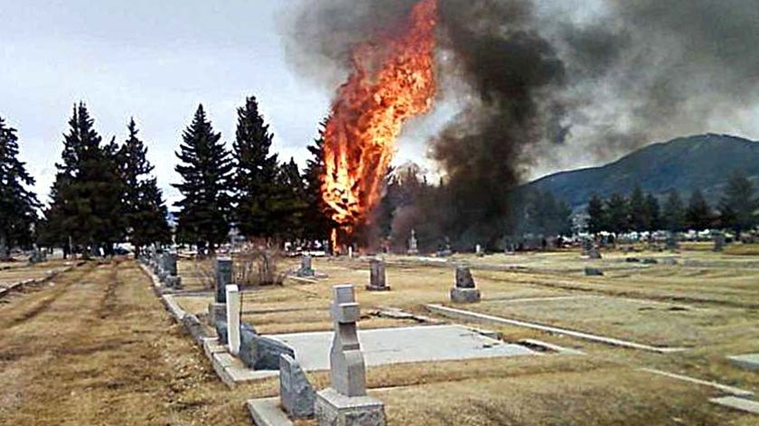 Flames reach skyward after a plane crashed near Butte airport in the US state of Montana