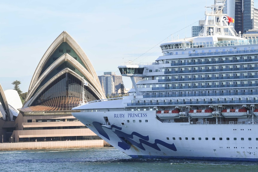 The Ruby Princess cruise ship sails past the Sydney Opera House as it departs Circular Quay.