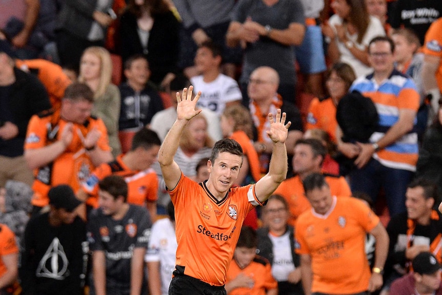 Matt McKay celebrates Brisbane Roar's goal against Melbourne Victory