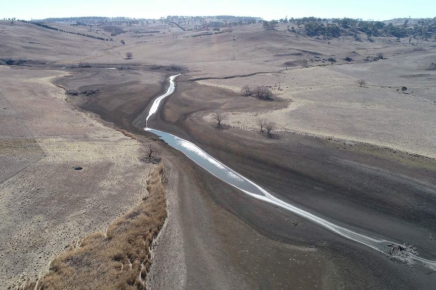 An aerial photo of Armidale's dry Malpas Dam.