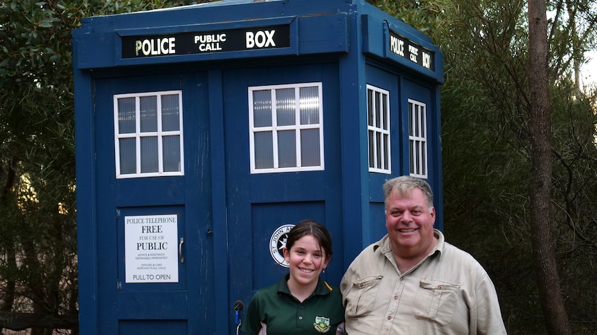 Clancy and Rob standing in front of the TARDIS replica.