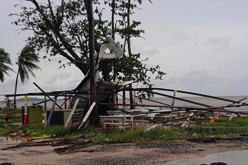 Roofing iron is strewn through a tree at Lockhart River.