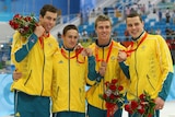 Grant Hackett, Nick Ffrost, Grant Brits, and Patrick Murphy pose with their bronze medals