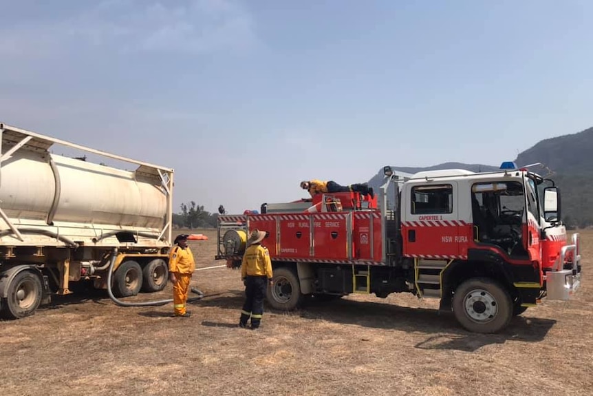 The Capertee RFS unit filling up its truck from a bulk water tanker during the 2019/20 bushfire season.