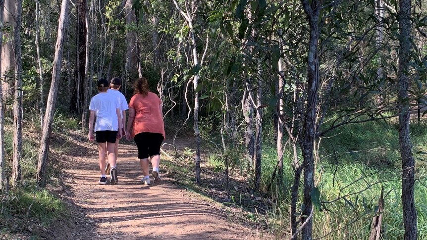Walkers at Enoggera Reservoir at Brisbane State Forest.