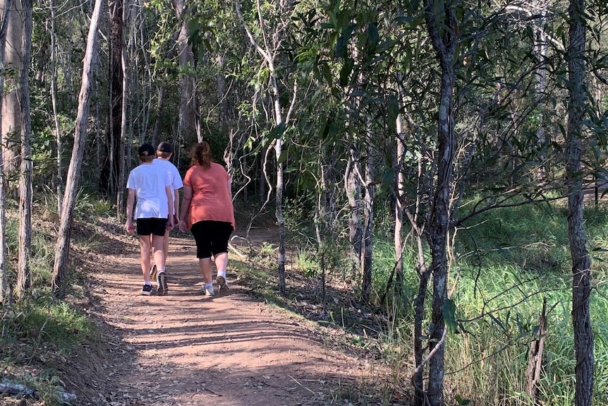 Walkers at Enoggera Reservoir at Brisbane State Forest.