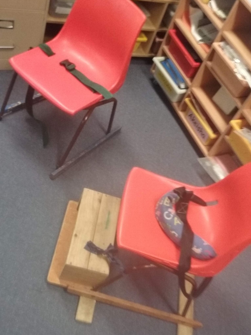 Two chairs with restraining belts Thomas Maker-North was strapped to in the classroom