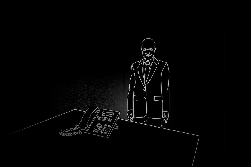 Black and white line drawing of man standing next to phone on desk.