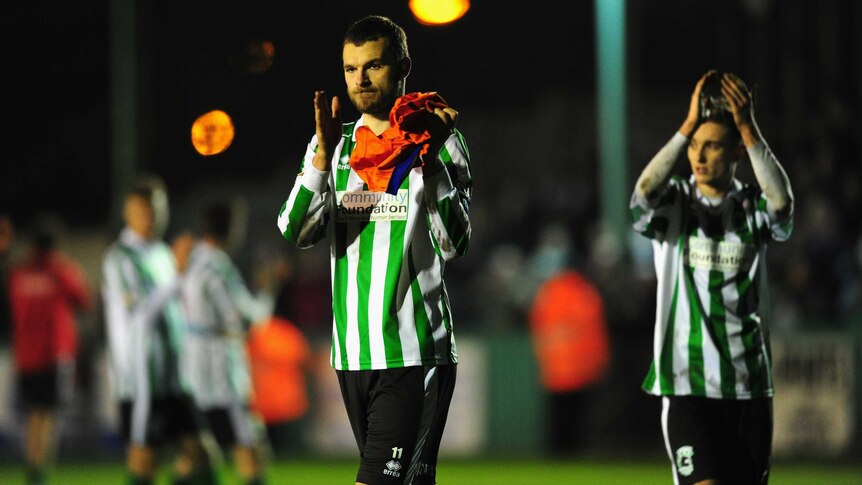 Blyth Spartans captain Robbie Dale (L) applauds the crowd after a FA Cup loss to Birmingham.