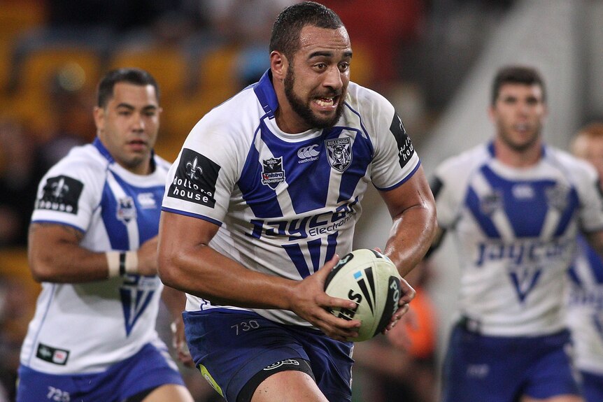 Big man with football: Sam Kasiano's ball-playing skills have added another dimension to the Dogs' attack.