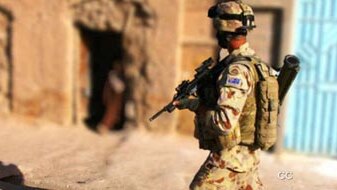 An Australian troop patrols in Afghanistan (ABC TV, file photo)
