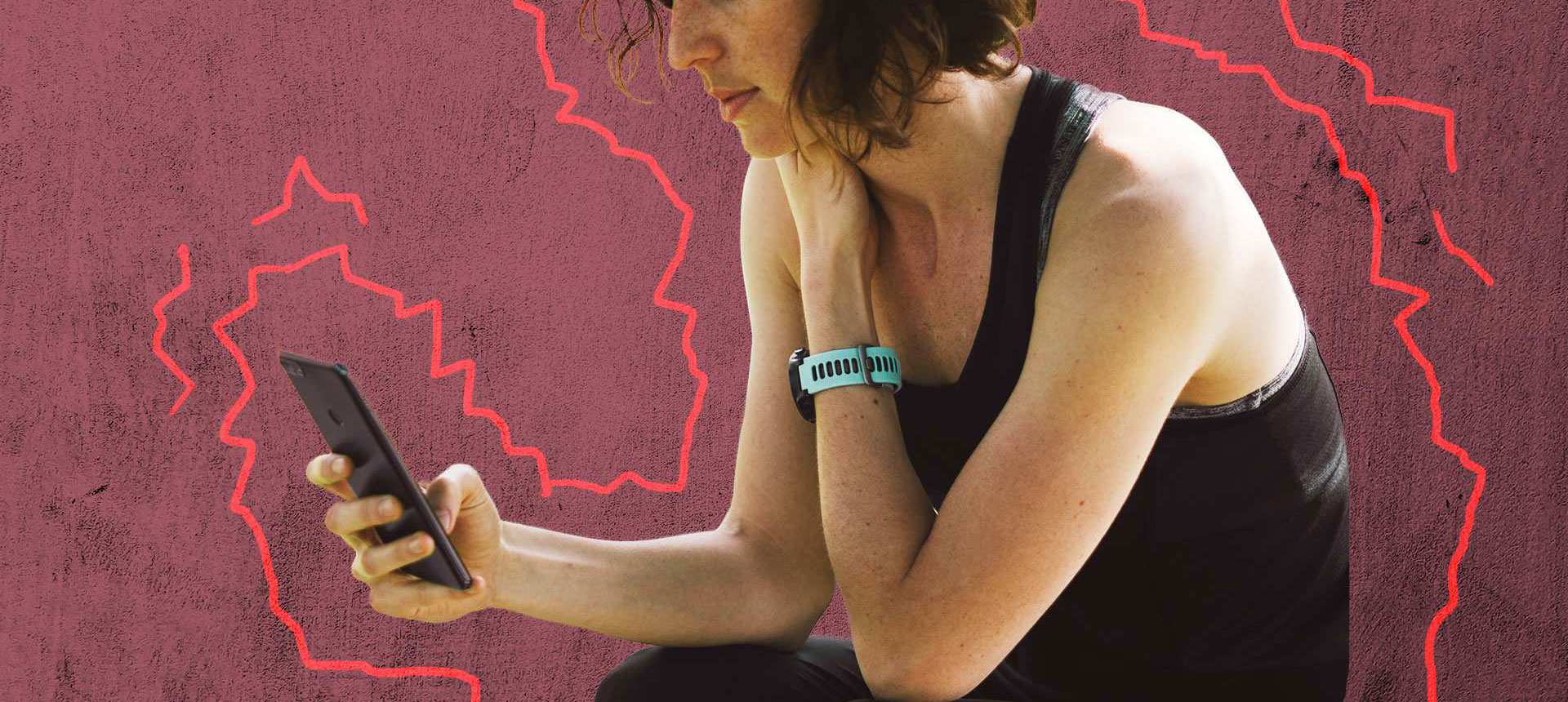 Woman looking at phone feeling sad in a story about recognising social abuse.