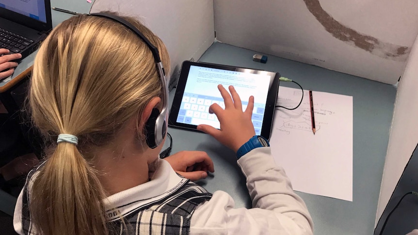 A student works through a practice NAPLAN test on an iPad.