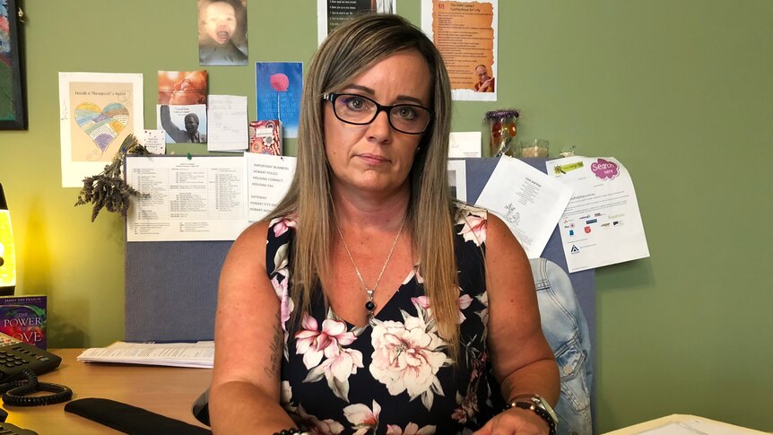 Housing Tasmania case worker Tara sitting at her desk, March 3 2019