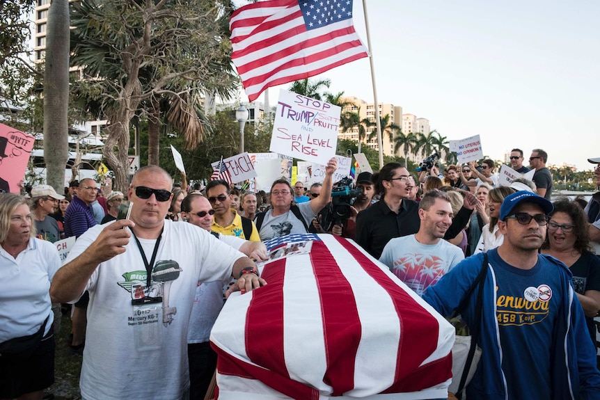 Trump protest in Florida with a coffin