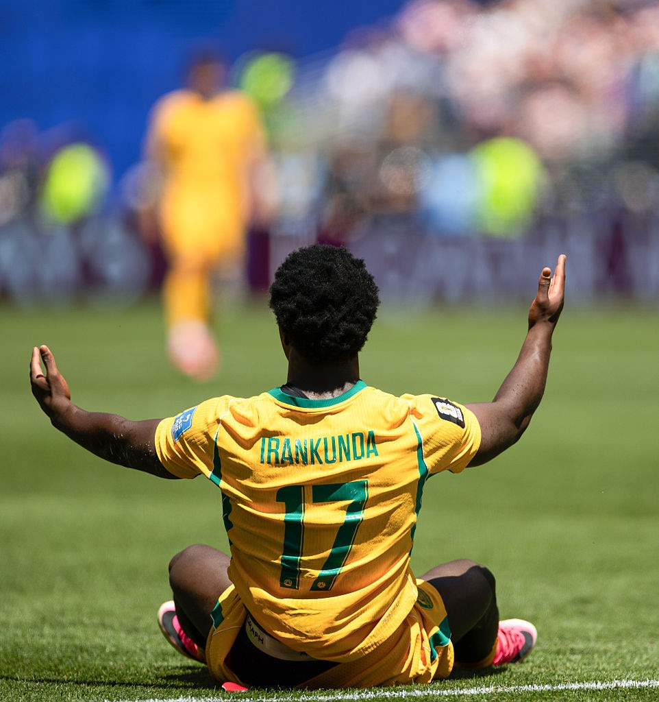 Nestory Irankuna holds out his hands