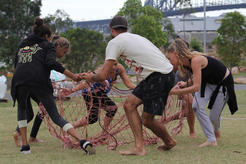 Jannawi Dance Clan rehearses a contemporary net dance for the Australia Day ceremony at Barangaroo.