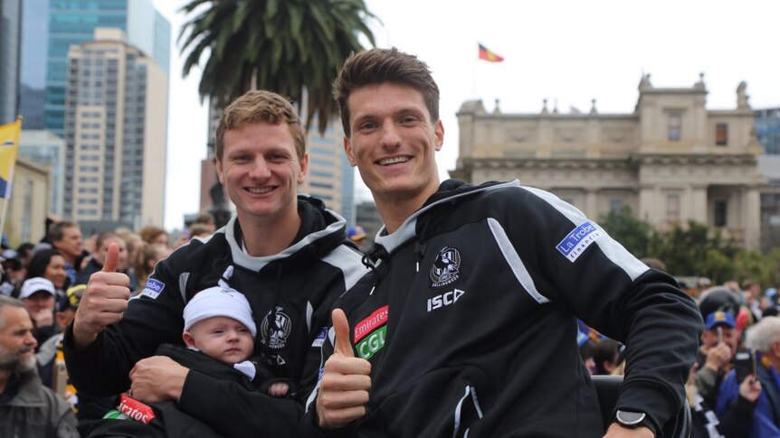 Collingwood player Brody Mihocek in the parade