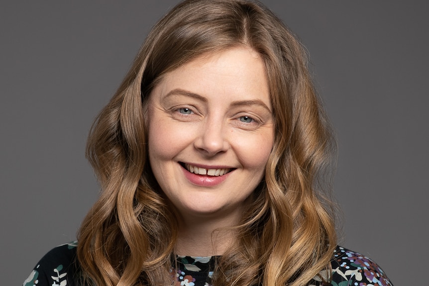 A portrait studio shot of Melanie Finch