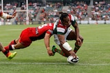 Touching down ... Lote Tuqiri scores a try for the Rabbitohs