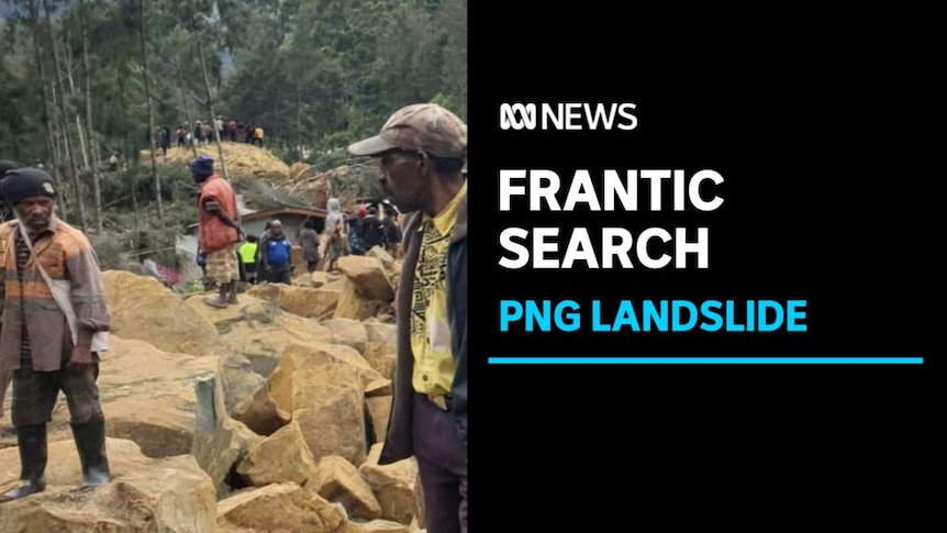 Frantic Search, PNG Landslide: Two men in the foreground walk over and look at rubble while a crowd mills in the background.