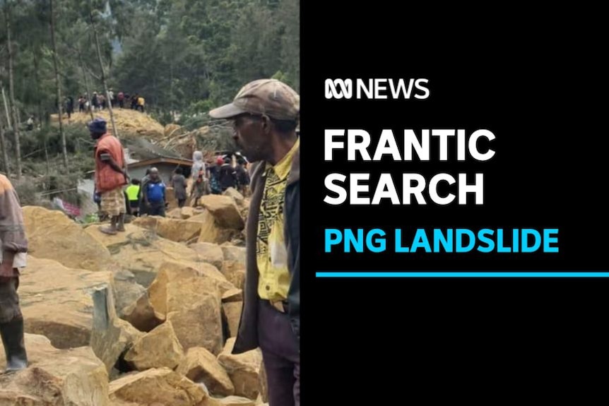 Frantic Search, PNG Landslide: Two men in the foreground walk over and look at rubble while a crowd mills in the background.