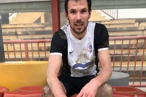 Bruno Boban sits on the sidelines covered in mud after a match in March 2018.