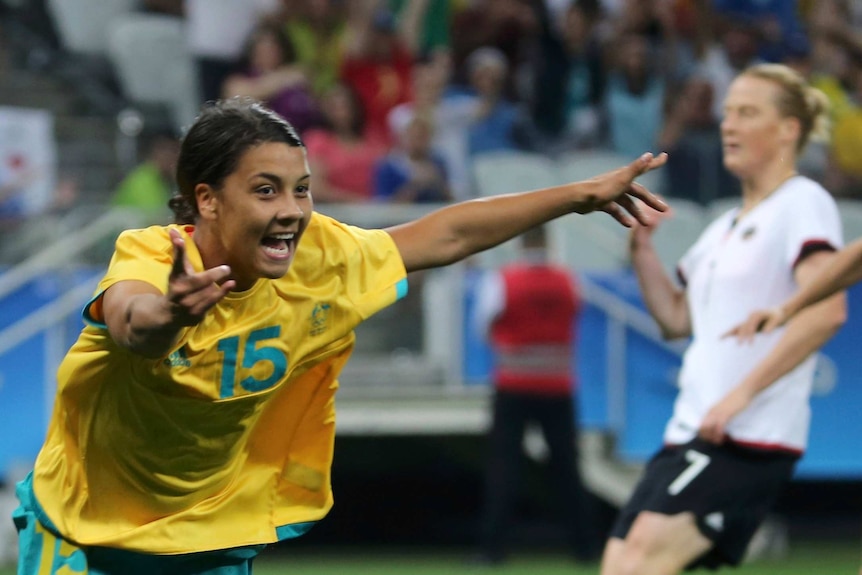 Samantha Kerr is seen celebrating a goal.