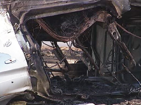 The burnt out interior of crashed car, Darwin