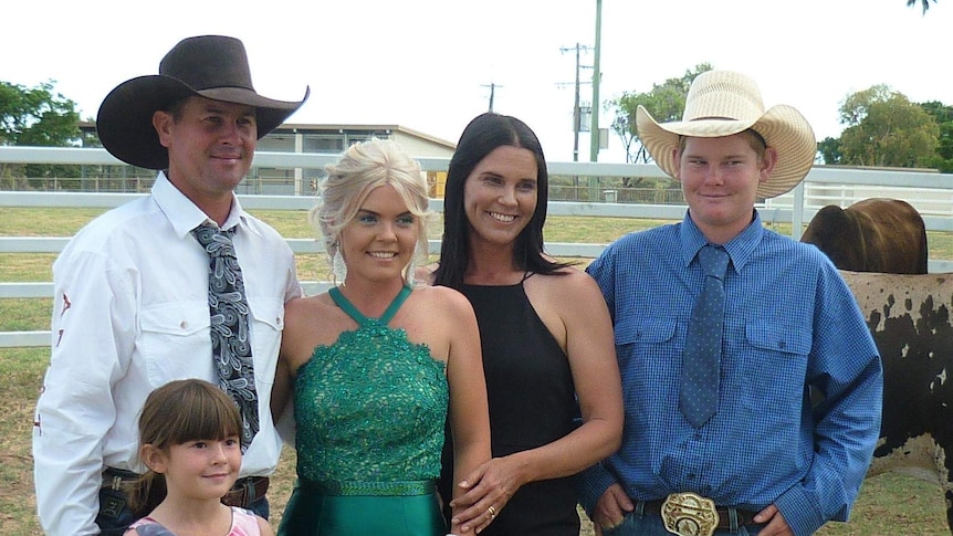 Grazing family pose for photo