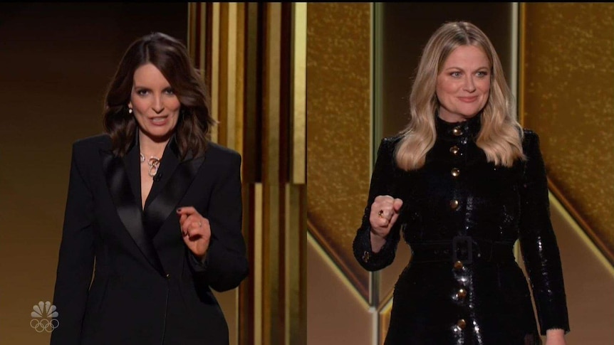 Tina Fey and Amy Poehler on a split screen, making it appear they are at the same venue.