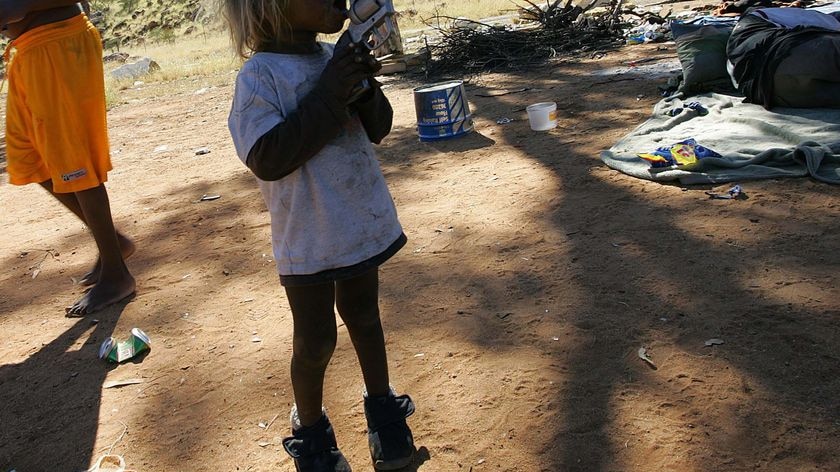 Aboriginal children play at a town camp