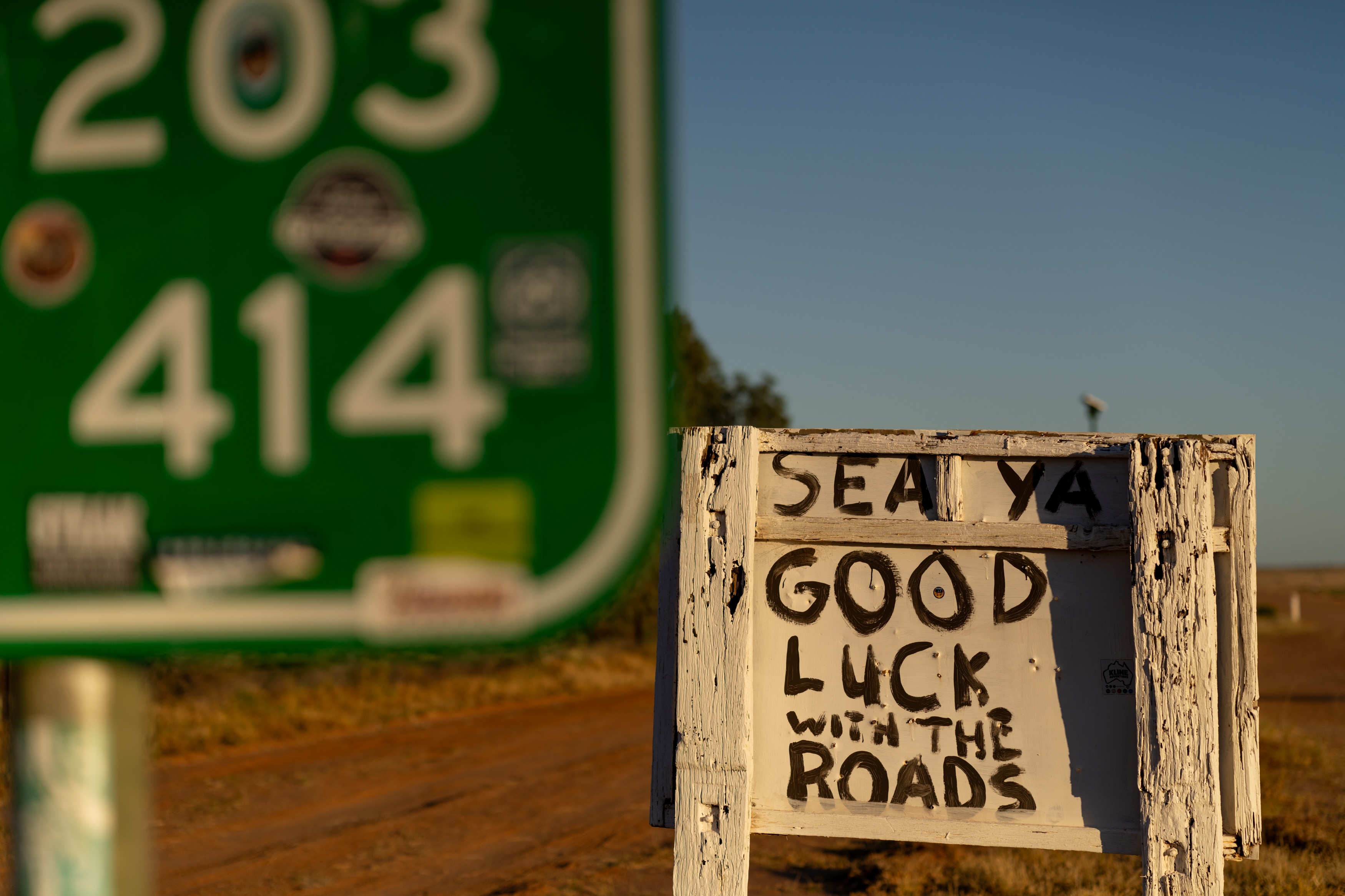 A sign which says sea ya good luck with the roads.
