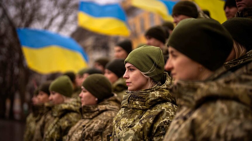 Ukrainian Army soldiers pose for a photo as they gather to celebrate a Day of Unity in Odessa, Ukraine