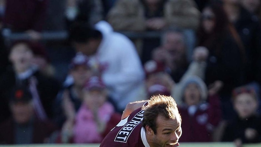 Brett Stewart races clear to score for Manly.