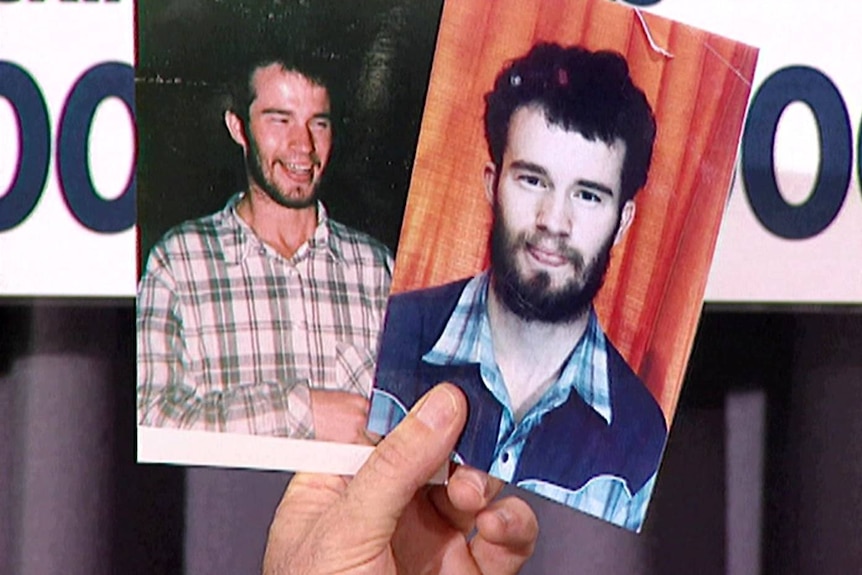 A hand holding a photo of a Snowtown victim.