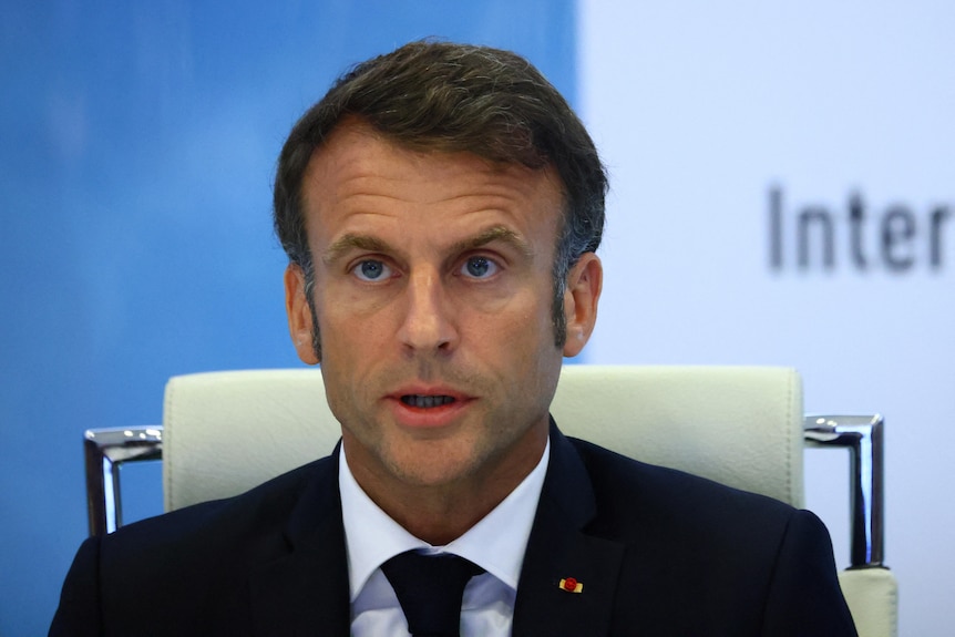 French President Emmanuel Macron speaks during a government emergency meeting. 