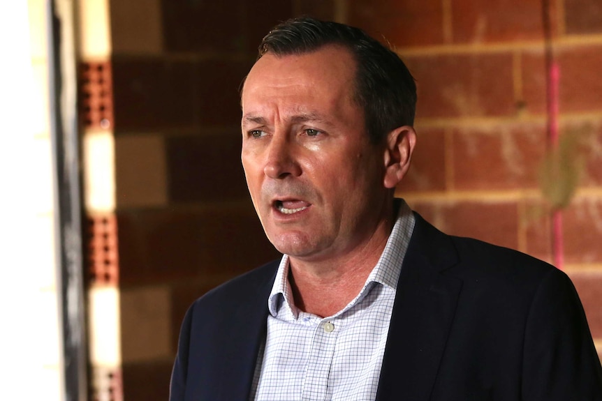 WA Premier Mark McGowan speaking at a press conference in a building site in Piara Waters, Perth.