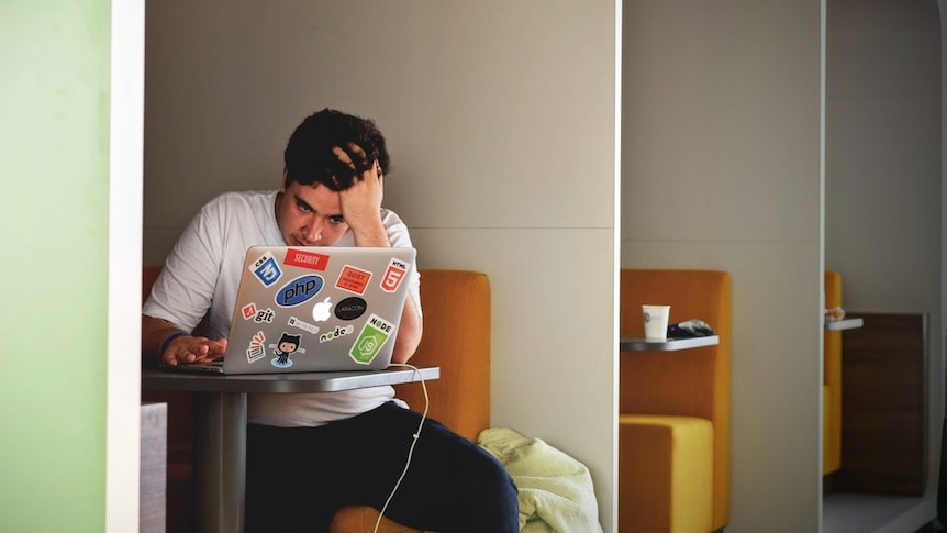 A student at a coffee shop