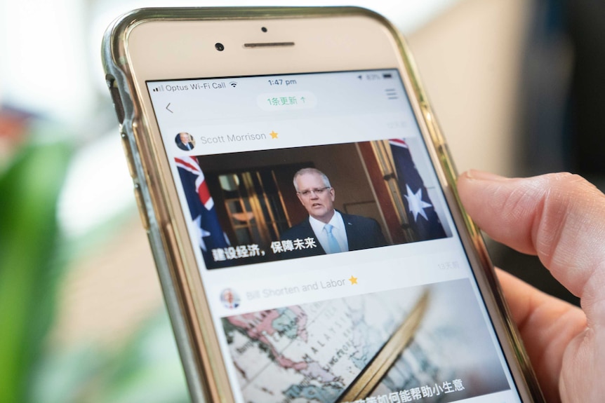 A mobile phone showing  Scott Morrison on WeChat.
