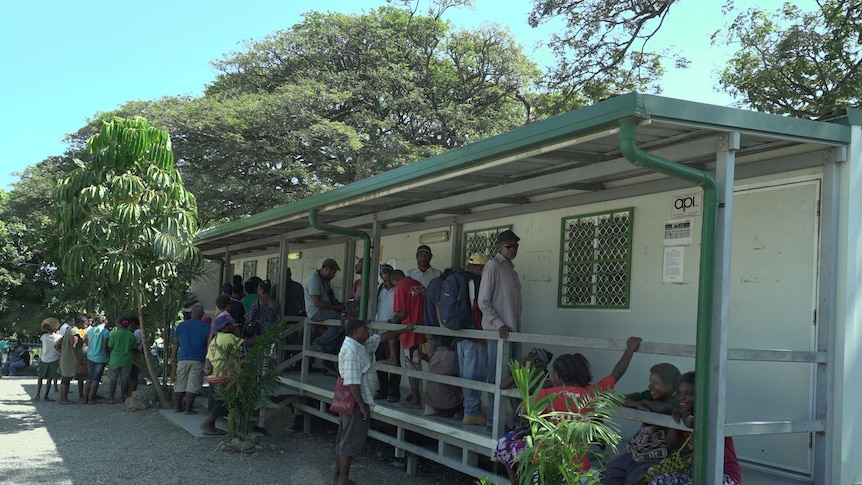 Residents lined outside the office