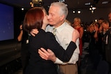 Prime Minister Julia Gillard embraces her father John