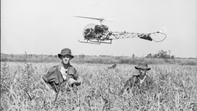 Australian soldiers in a field in Vietnam, 1966