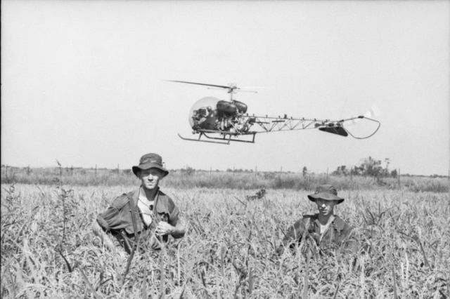 Australian soldiers in a field in Vietnam, 1966