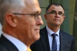 Malcolm Turnbull and former judge Brian Ross Martin stand together