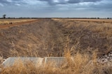 An empty irrigation channel