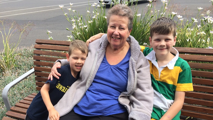 Anne Pedler with two young boys.