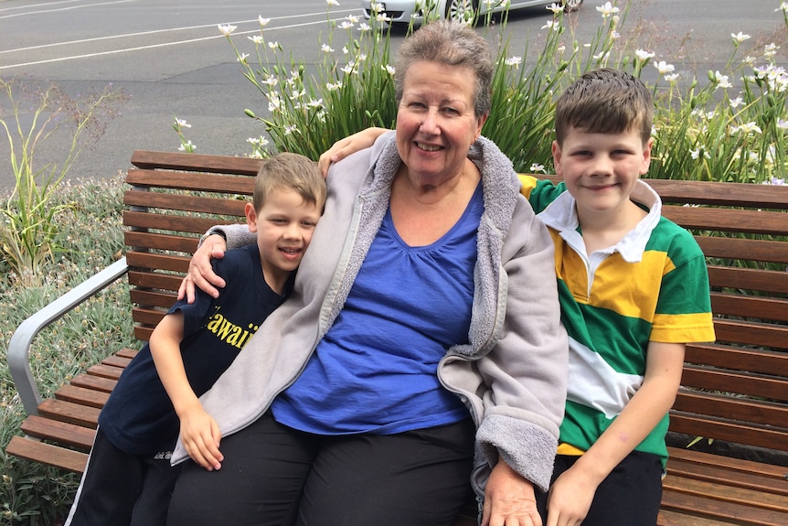 Anne Pedler with two young boys.