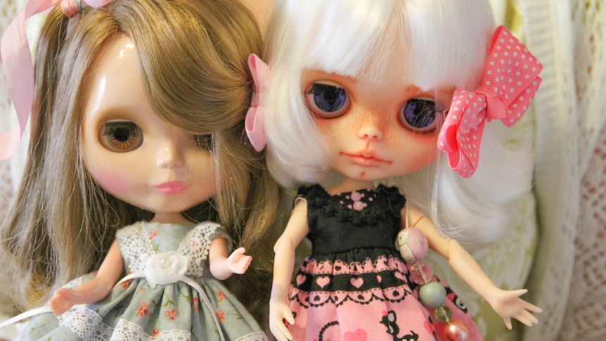 Two dolls side by side
